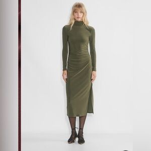 Wilfred
Remedy Longsleeve Dress
Colour is burgundy 
Size Medium never worn